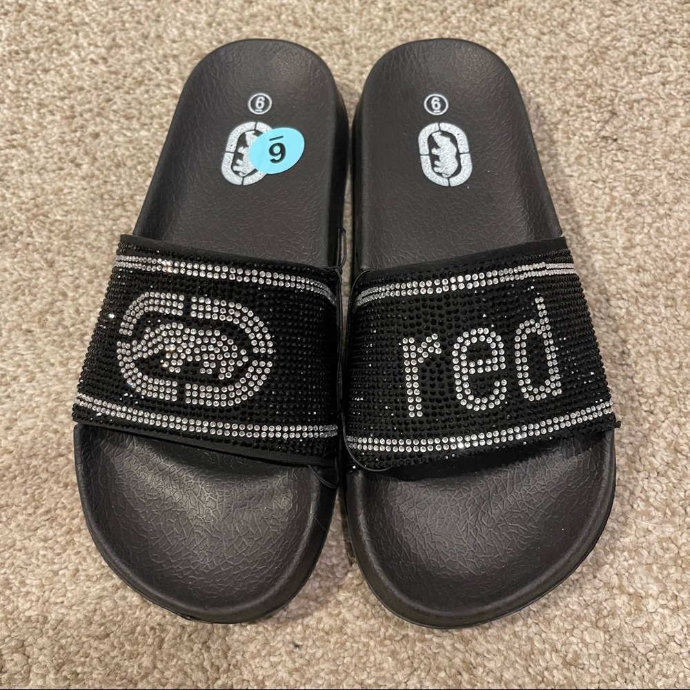 Slides / Rhino brand / size 6 / black and silver